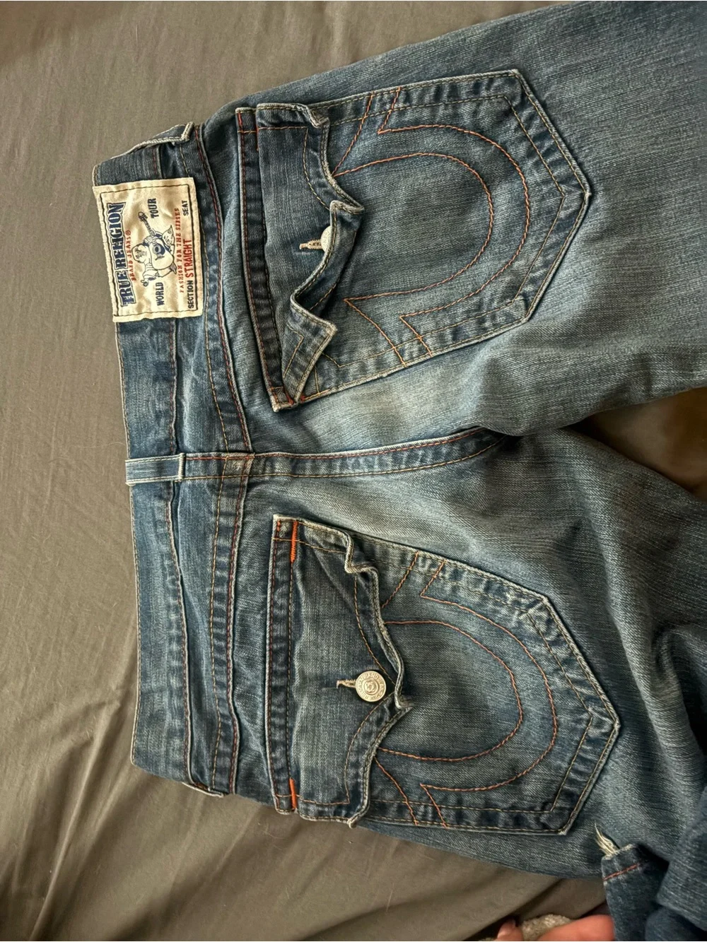 True Religion Men's Straight Jeans in Medium Blue with Distressed Hem